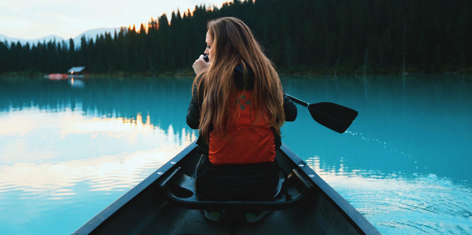 Woman on a Canoe Boat